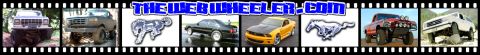 1993 Ford Bronco - This 1993 Ford Bronco is shown from the front, lifted with large off-road tires.