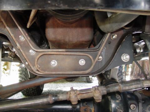 1986 Ford Bronco - Close-up view of the steering and suspension system of an older vehicle, possibly from the 1980s.