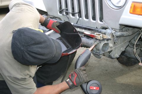 2003 Jeep TJ - Welding a bracket on the front bumper of a 2003 Jeep TJ.