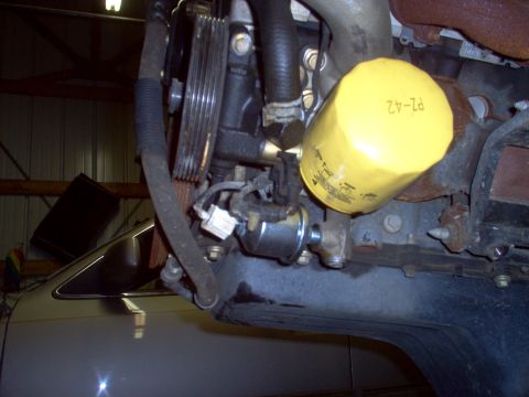 1994 Ford Crown Victoria - The sender uses a different terminal, so the connector will have to be changed. The black connector above the silver sender is for the EVO…