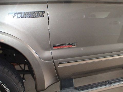 2004 Ford Excursion - New Ford OEM PSD Badges. One for each side!
