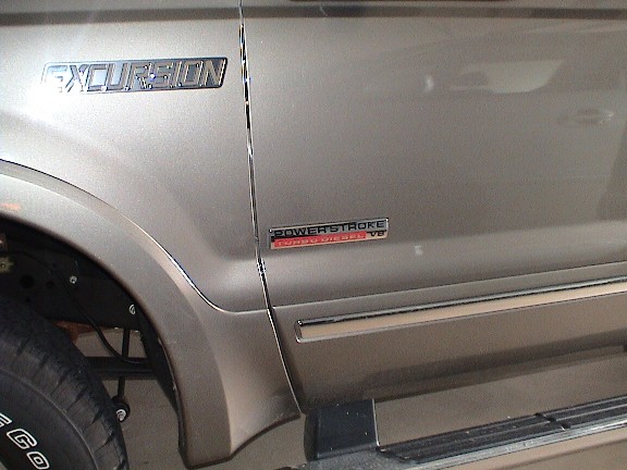 New Ford OEM PSD Badges.  One for each side!