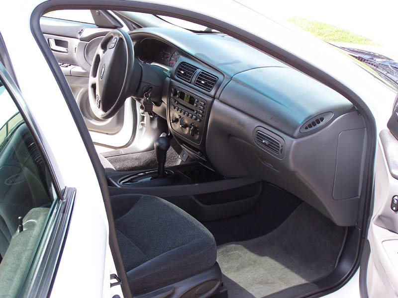 2001 Ford Taurus interior with dark gray seats and dashboard