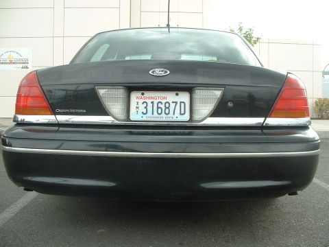 1999 Ford Crown Victoria - "Seattle" "Police" are in the boxes on the trunk.