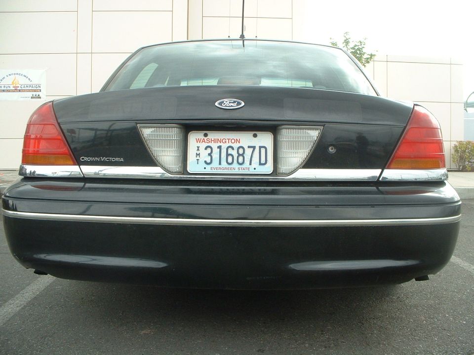 "Seattle"  "Police" are in the boxes on the trunk.
