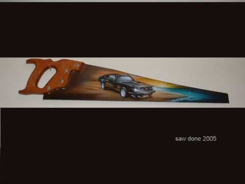 1978 Ford Mustang II - A 1978 Ford Mustang II is airbrushed onto a saw blade, depicting a beach scene.