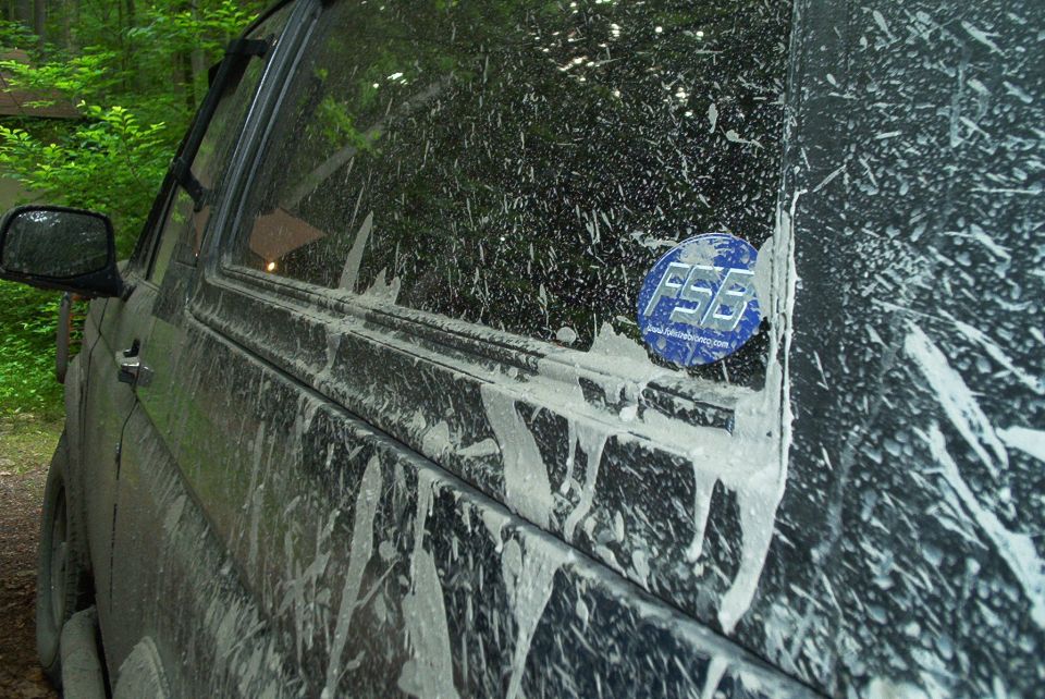 Mud-splattered SUV side with FSB sticker