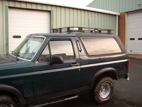 1993 Ford Bronco - This 1993 Ford Bronco is equipped with a custom safari rack, ready for adventure.