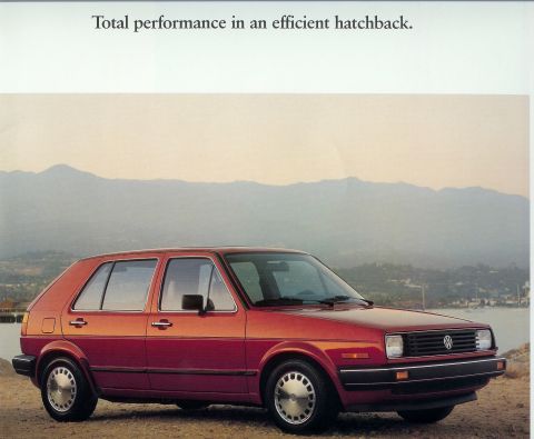 1987 Volkswagen Golf - This 1987 Volkswagen Golf hatchback is shown in a scenic outdoor setting.
