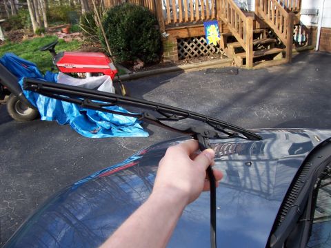 1999 Ford Taurus - new one on driver's side. installation took 2 minutes, snaps on.