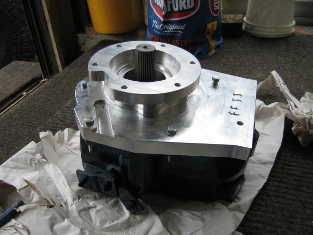 Here is the installed adapter from Offroaddesign.com, I cleaned and painted the front half range box of the NP203.