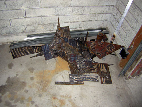 abstract metal sculpture made of welded scrap metal pieces