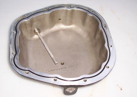 1994 Ford F-150 - Differential cover with part number RMJ F400121025 stamped on the inside surface.