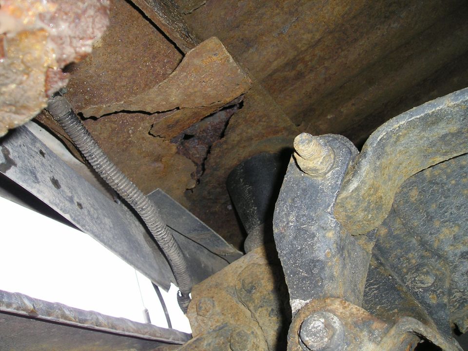 Rusted frame and suspension components with a wire loom