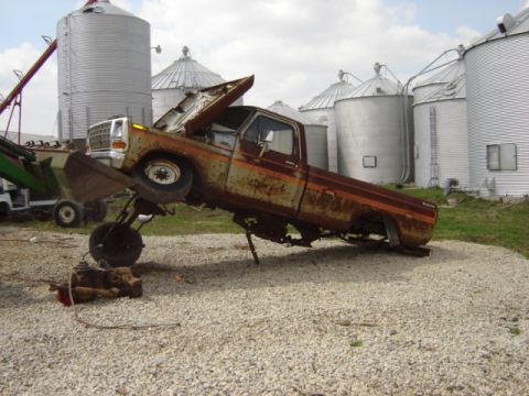 1992 Ford Bronco - This old pickup truck is in rough shape, with its engine removed and body heavily rusted.