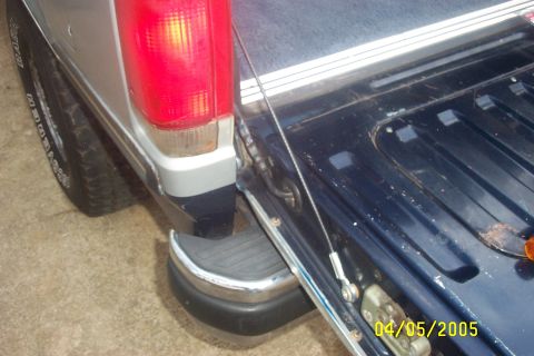 1979 Ford F-150 - Close-up view of a pickup truck's rear, showing the tailgate and taillight. A date stamp is visible in the lower right corner.