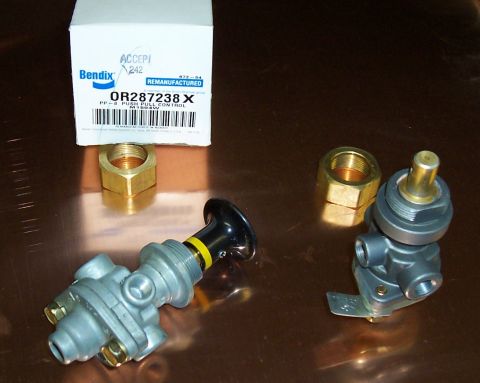 1994 Ford F-150 - Air system components including a Bendix push-pull control and an air valve, alongside brass fittings.
