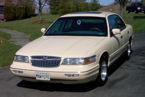 1996 Mercury Grand Marquis - My new HPP wheels, older style with machined outer lip and new Cooper Cobra G/T 235-55-16 tires.