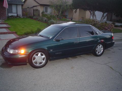 1993 Ford Taurus - This 1993 Ford Taurus sedan is shown in a 3q-front view.