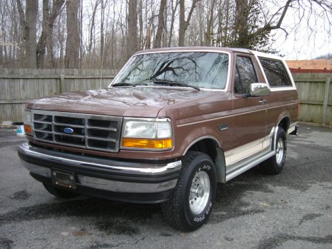 1993 Ford Bronco - This 1993 Ford Bronco is shown in a three-quarter front view, parked outdoors.