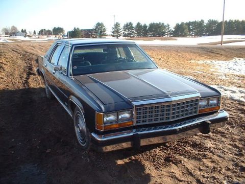 1984 Ford Crown Victoria LTD - Sitting in my muddy driveway in the evening light.
