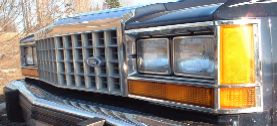 1984 Ford Crown Victoria LTD - Front end of a Ford truck, showing the grille and headlight assembly.