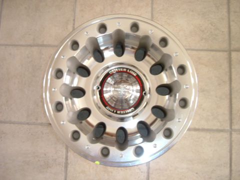 1993 Ford Bronco - Rim shown with the Center cap. Since my Bronco currently has auto locking hubs, I will probably put some spacers behind the wheels to incre…