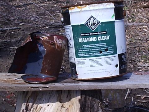 1996 Ford Bronco - .50 cal muzzle loader does wonders to a paint can full of water!! The holes in the big can are the size of my middle finger, there was no w…