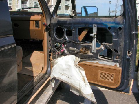1990 Ford Bronco - Remove the door panel and speaker. DO NOT remove the plastic trash bag. It's a moisture barrier so don't take it out. During some of the in…
