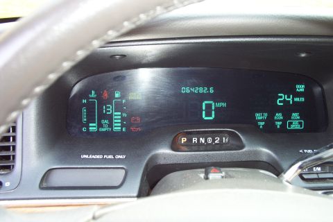 1996 Ford Crown Victoria - The digital display shows the vehicle's speed, fuel level, and trip odometer information.