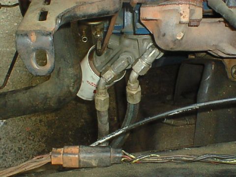 1976 Ford F-250 - Here is the adapter installed with the filter and lines.