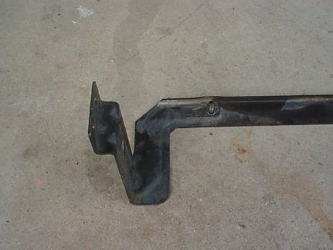 1976 Ford F-250 - Here is the late model oil cooler bracket after I bent the end 90 degrees. You can see that I bent it in line with the edge where it drops…