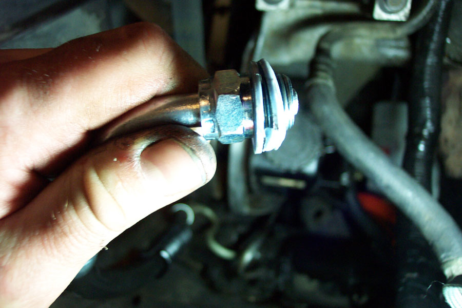 Forth try at sealing the Sag pump. Two nylon washers on the stock Bronco line (16mm Ford type 3 fitting).  This does not work.