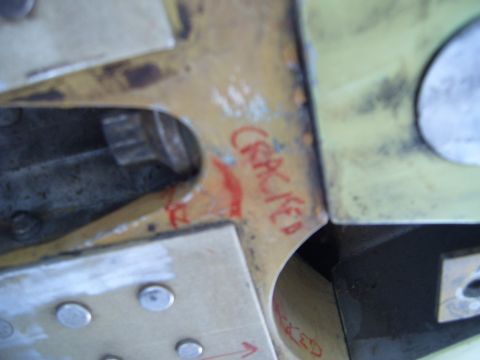 1988 Ford Bronco - Metal part marked with 'CRACKED' in red, possibly indicating damage or a repair note.