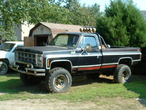 $500 - 1978 GMC 1ton on 38's for parts. I took the Front d60 (yay), dual tanks and wiring, factory tach, rollbar, radiator and gave the leftovers away!!!! sold my d44 front and the 14bolt from this for $250.. so all that cost me $250  [;-P>