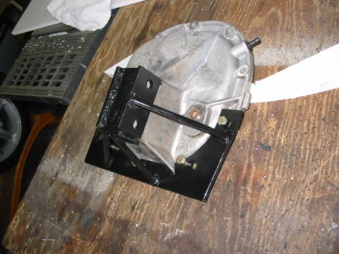 1985 Ford LTD Crown Victoria - A differential housing is shown with a custom black metal mounting bracket bolted to it.