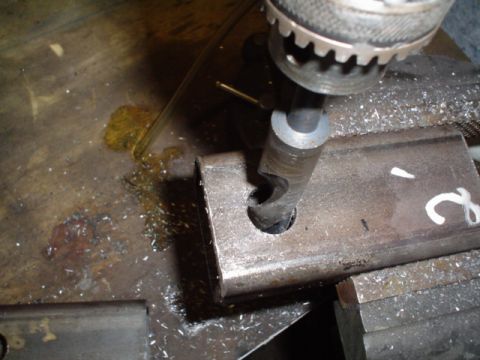 1981 Ford Bronco - reaming out the holes for the tow hooks... way bigger then 3/4"