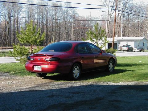 1997 Ford Taurus - This 1997 Ford Taurus is seen from the rear in a residential setting.