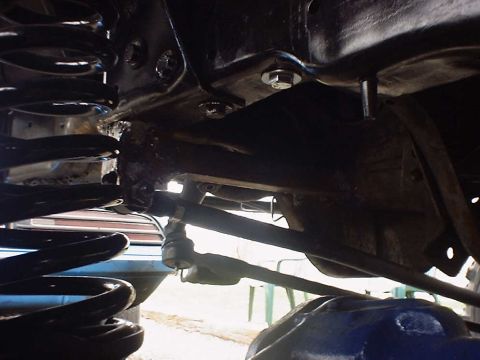 1988 Ford Bronco - Undercarriage view of suspension components, possibly from a truck or SUV.