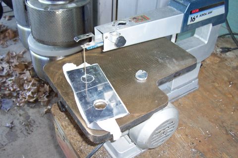 1994 Ford F-150 - Ryobi 16" scroll saw cutting a metal piece with a blade.
