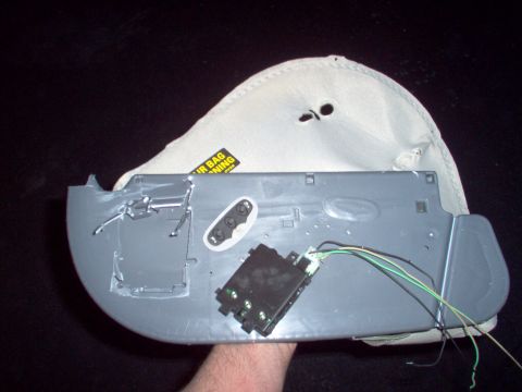 1994 Ford Crown Victoria - This visor came from an '02 LTC, but it won't fit my '94 CV, so I'm pulling the HomeLink out of it to mount somewhere in my car. It took so…