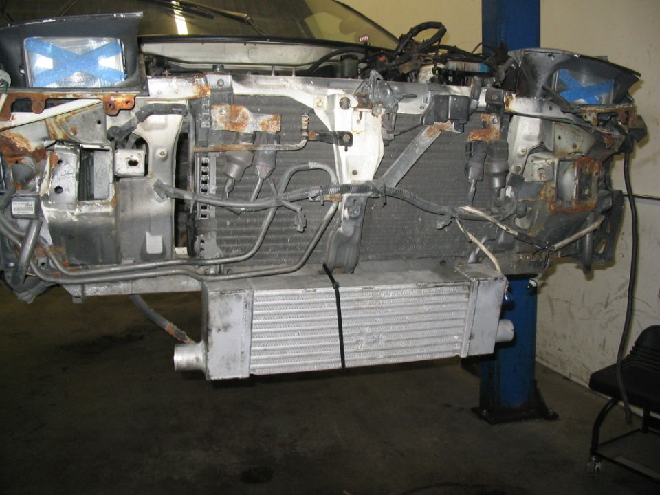 car front end disassembled, showing radiator and intercooler
