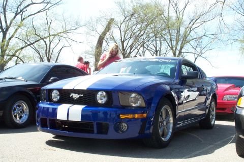 1998 Ford Crown Victoria - 2005 Roush Mustang.