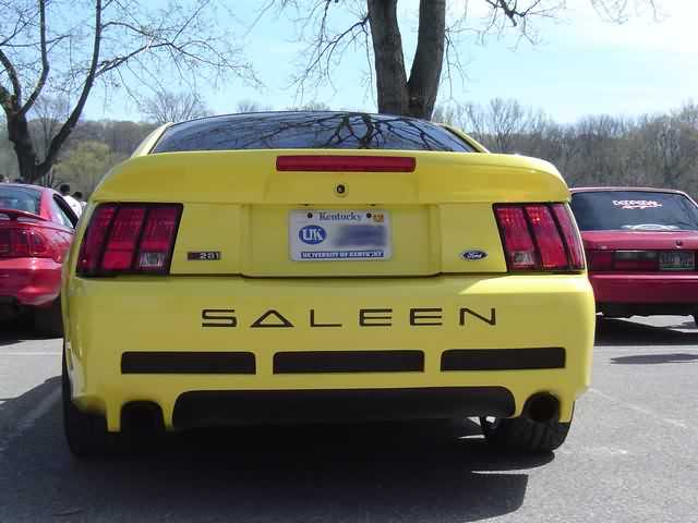 Rear of yellow Ford Mustang Saleen coupe with Kentucky plate in a parking lot