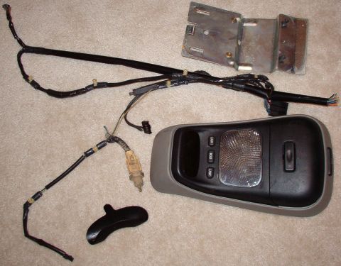 1983 Ford Bronco - SOLD Explorer OH Console Kit includes everything shown: mounting bracket, all screws, original sunglasses clip & remote velcro, enough wiri…