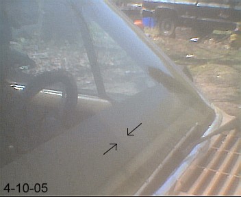 1988 Jeep Cherokee - The front of a light-colored 1988 Jeep Cherokee is visible, with a date stamp of 4-10-05.