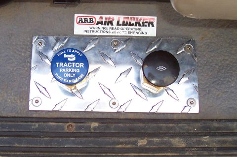1994 Ford F-150 - Interior view of a vehicle showing an ARB Air Locker control and a Bendix tractor parking brake control.