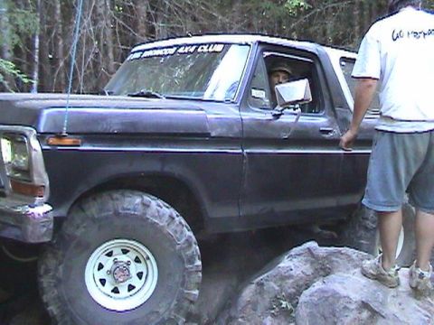 1978 Ford Bronco - This 1978 Ford Bronco navigates a rocky trail, with another vehicle visible to the left.