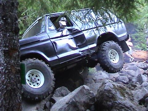 1978 Ford Bronco - This 1978 Ford Bronco navigates a challenging rocky terrain, demonstrating its off-road capabilities.