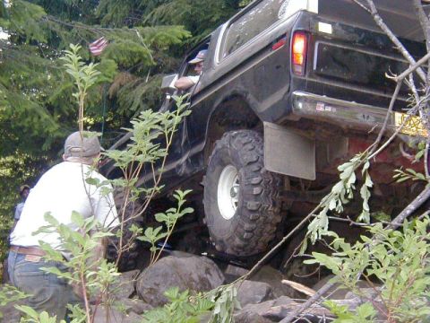 1978 Ford Bronco - This 1978 Ford Bronco navigates a challenging off-road course with steep inclines and large rocks.